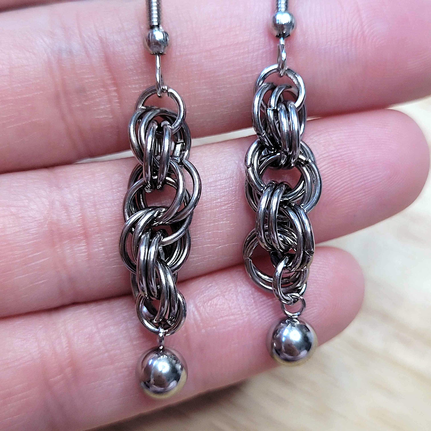 Double spiral and ball earrings