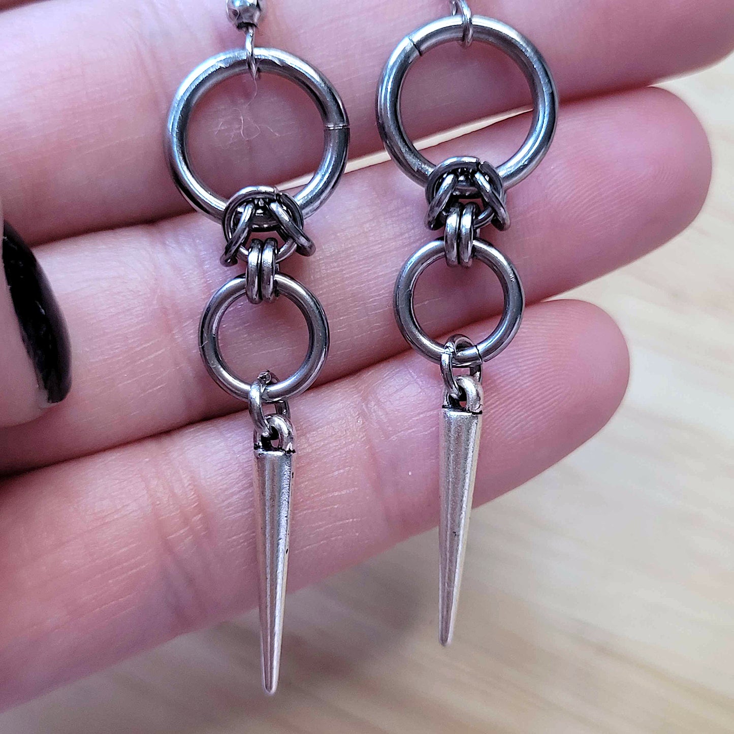 Double loop and spike earrings
