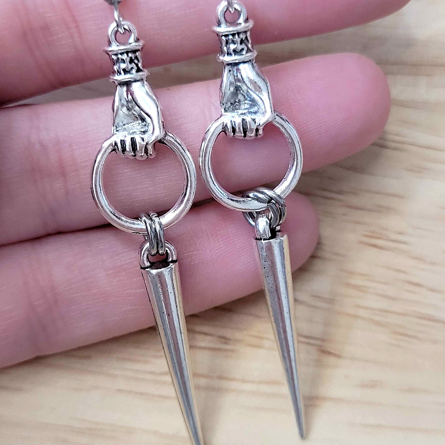 Gothic hand loop and spike earrings
