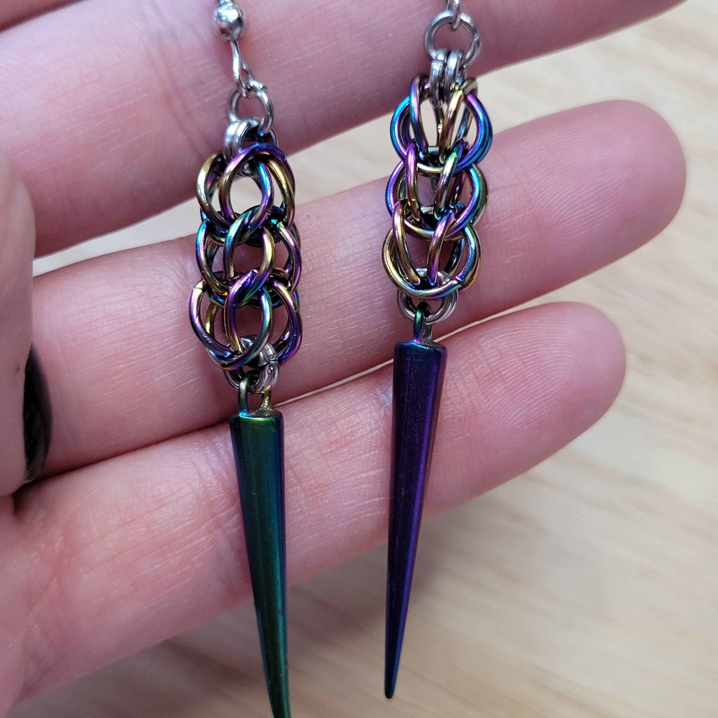 Anodized steel full persian spike earrings