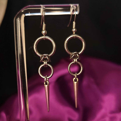 Double loop and spike earrings
