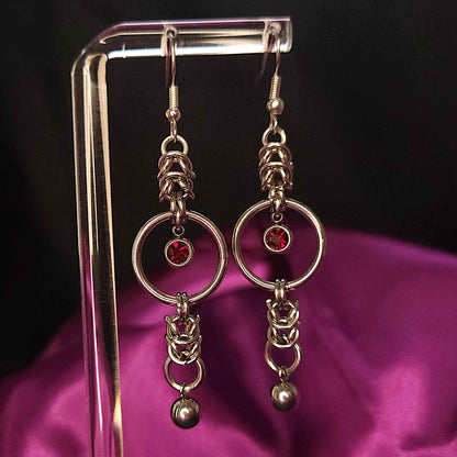 Mid loop red gem and ball earrings