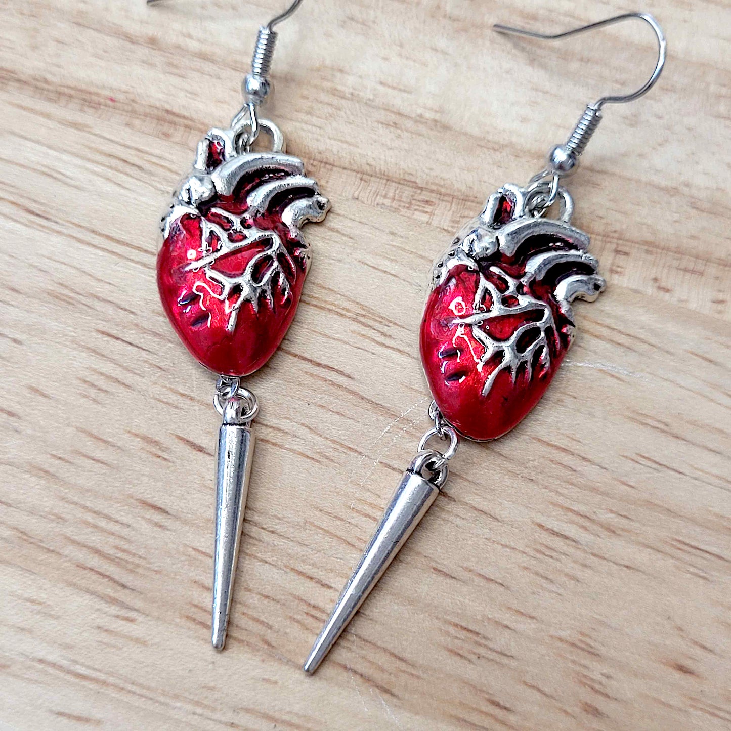 Gothic anotomical heart charm earrings with spike