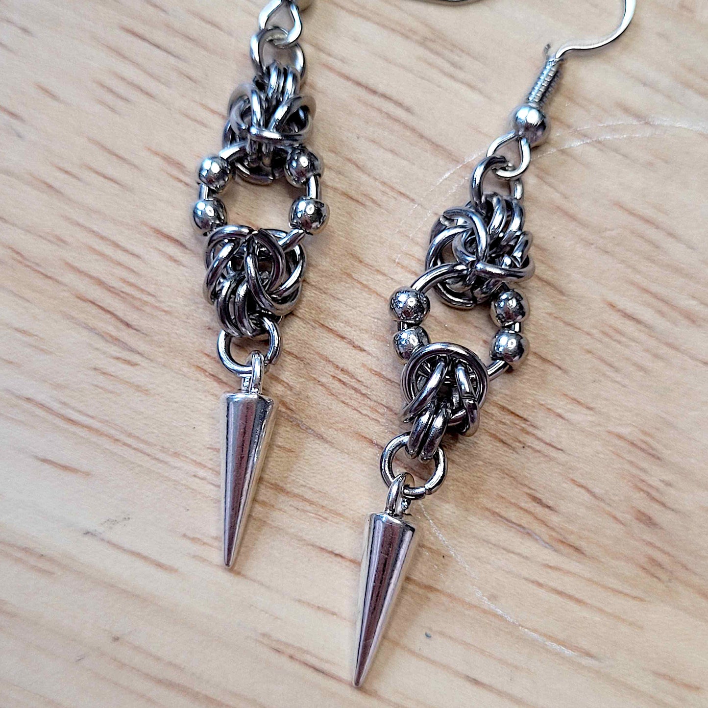 Mid loop beaded byzantine and spike earrings