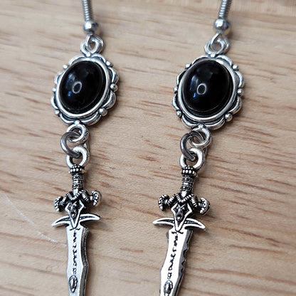 Gothic black cabochon and decorative dagger charm earrings