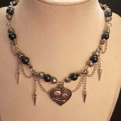 Dark valentine blue pearl and spike necklace