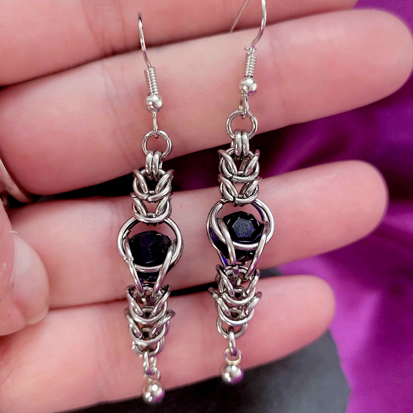 Blue captured bead and box chain earrings