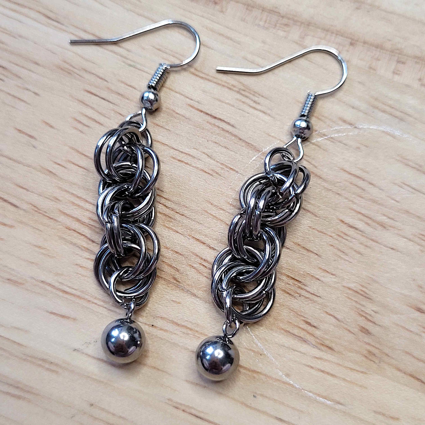 Double spiral and ball earrings
