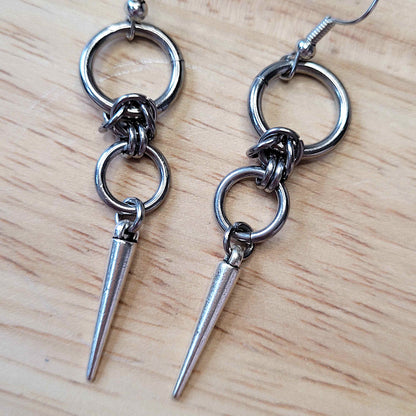 Double loop and spike earrings