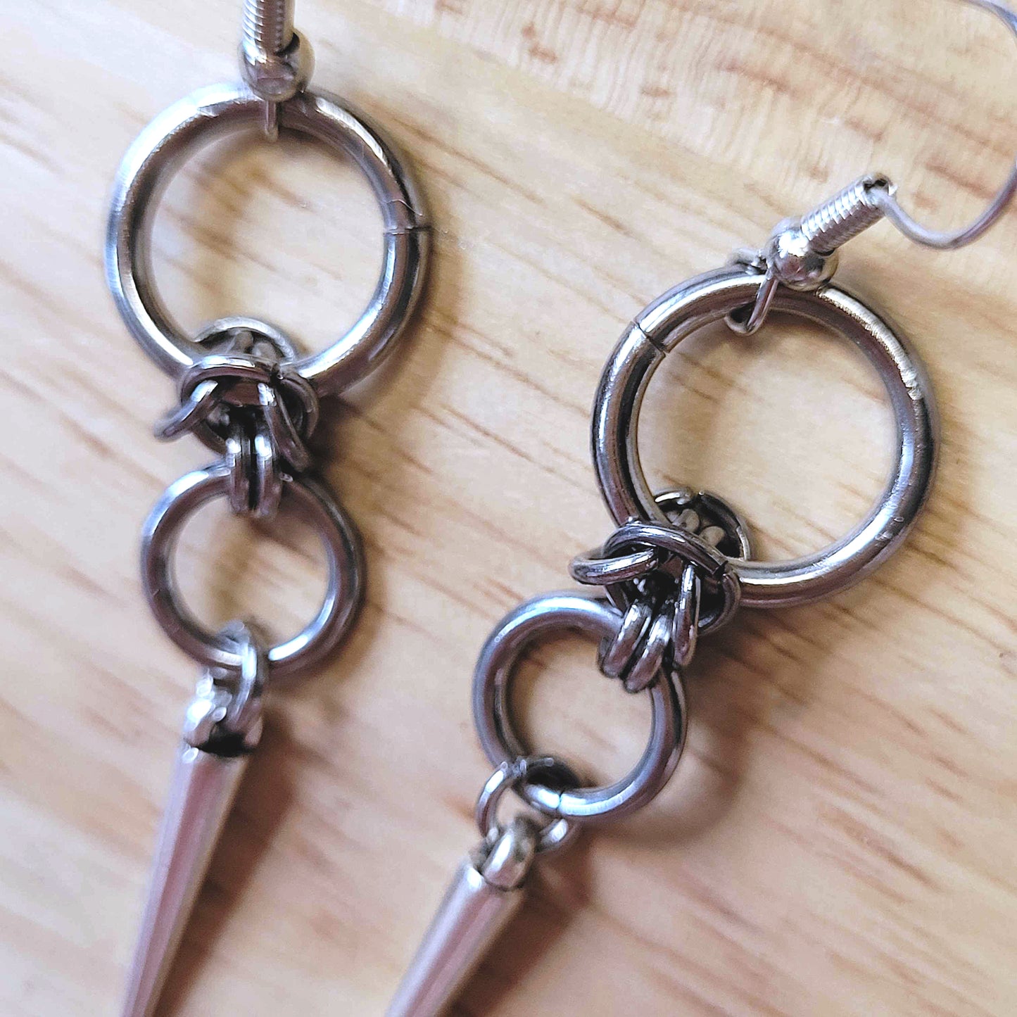 Double loop and spike earrings