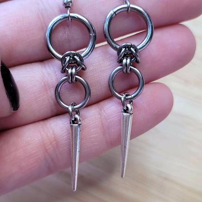 Double loop and spike earrings