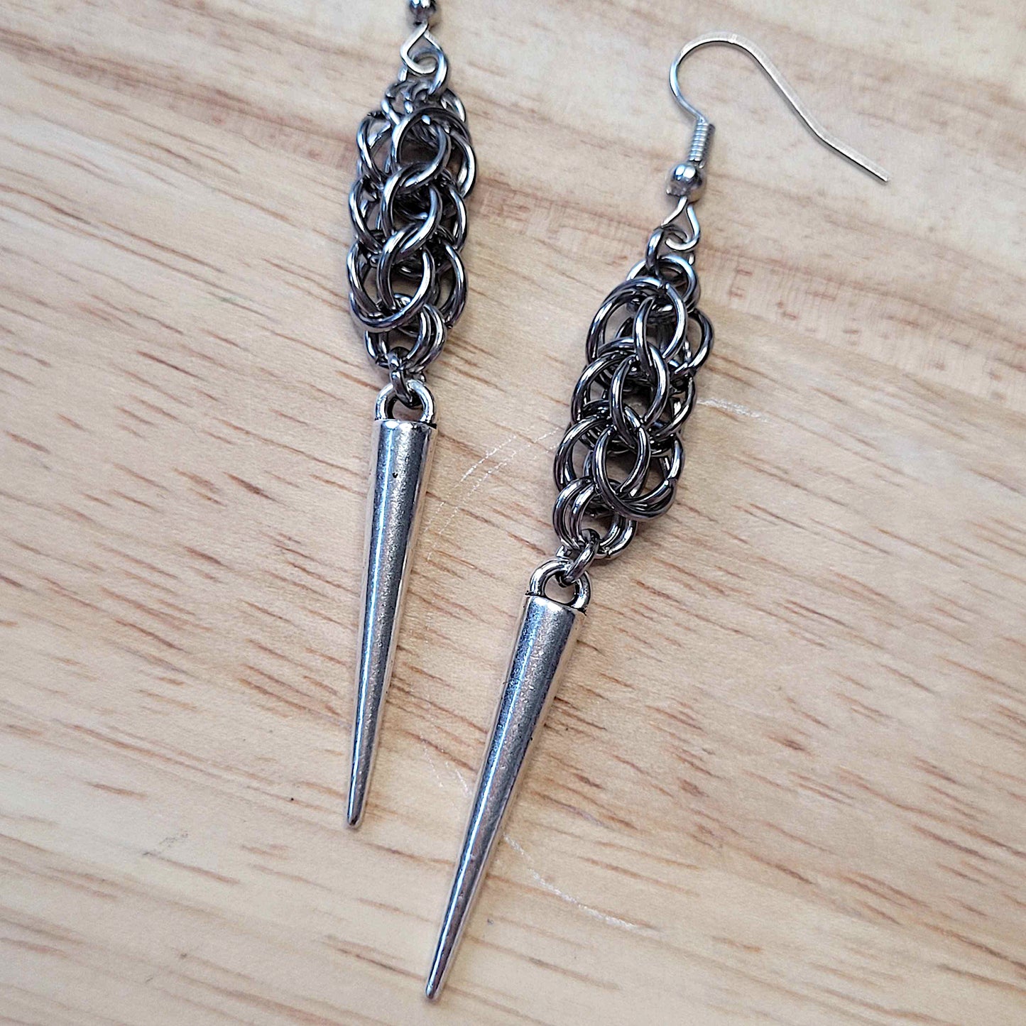 Full persian weave spike earrings