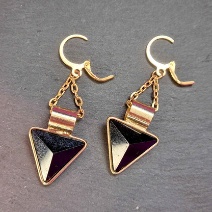 Gold tone black triangles on hoops