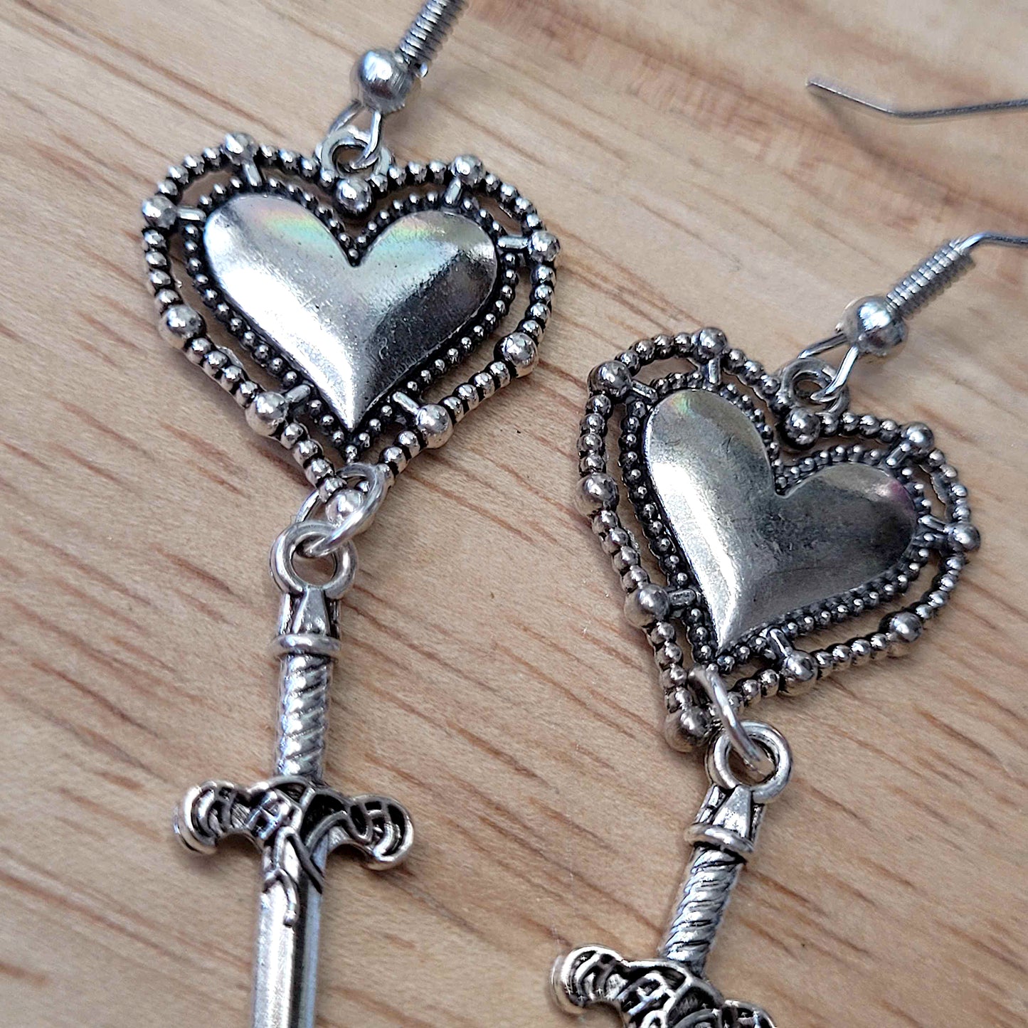 Gothic heart and dagger earrings
