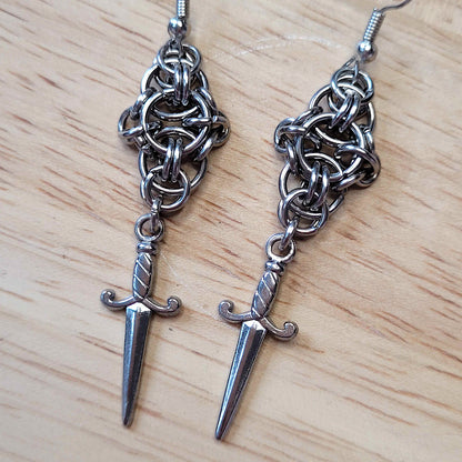New dawn dagger earrings