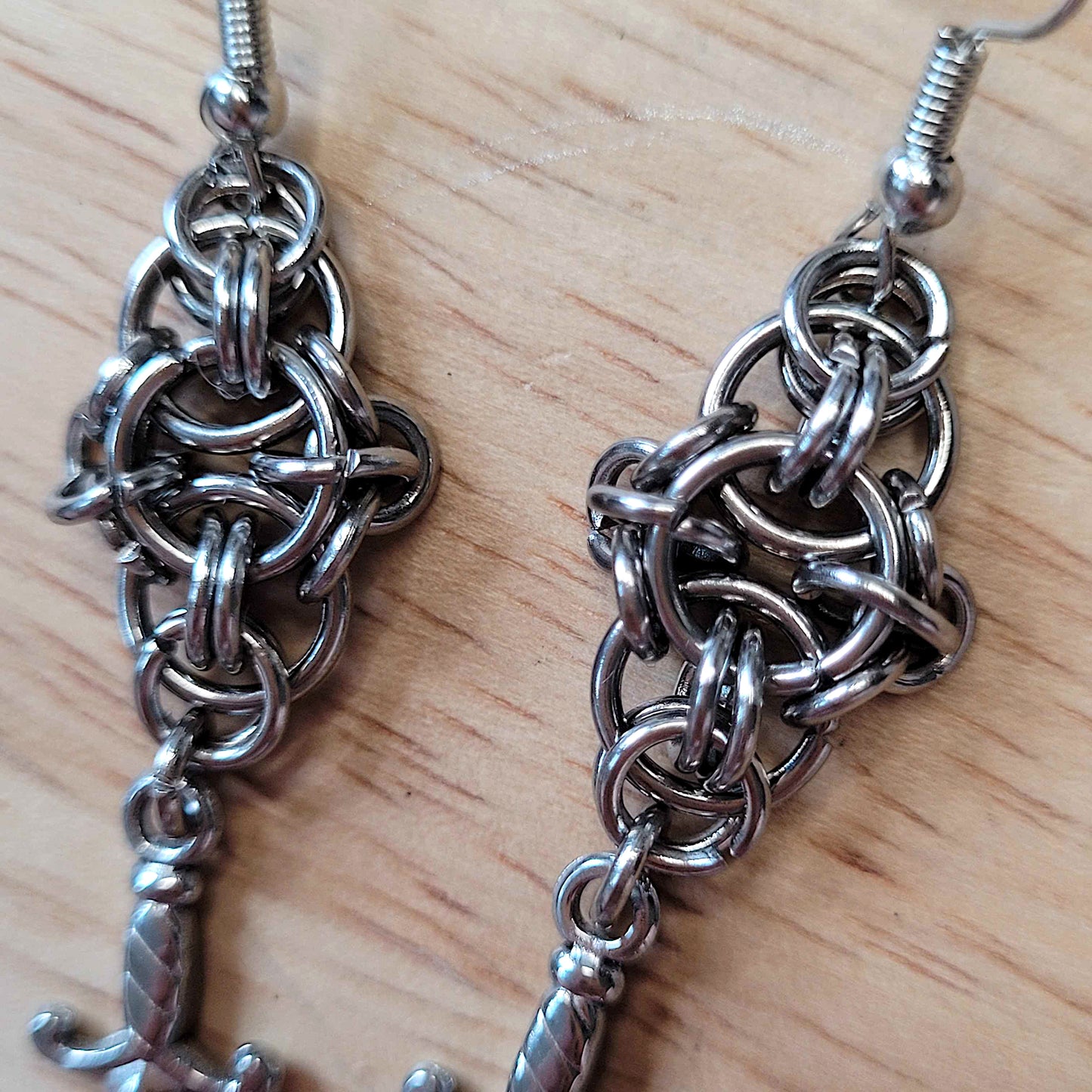 New dawn dagger earrings