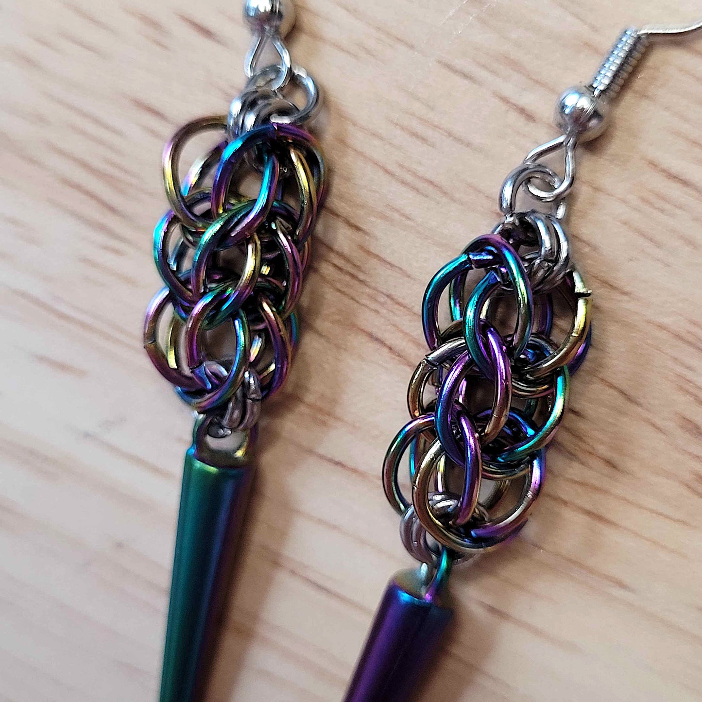 Anodized steel full persian spike earrings
