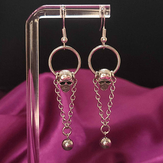 Skull and ball charm dangle earrings